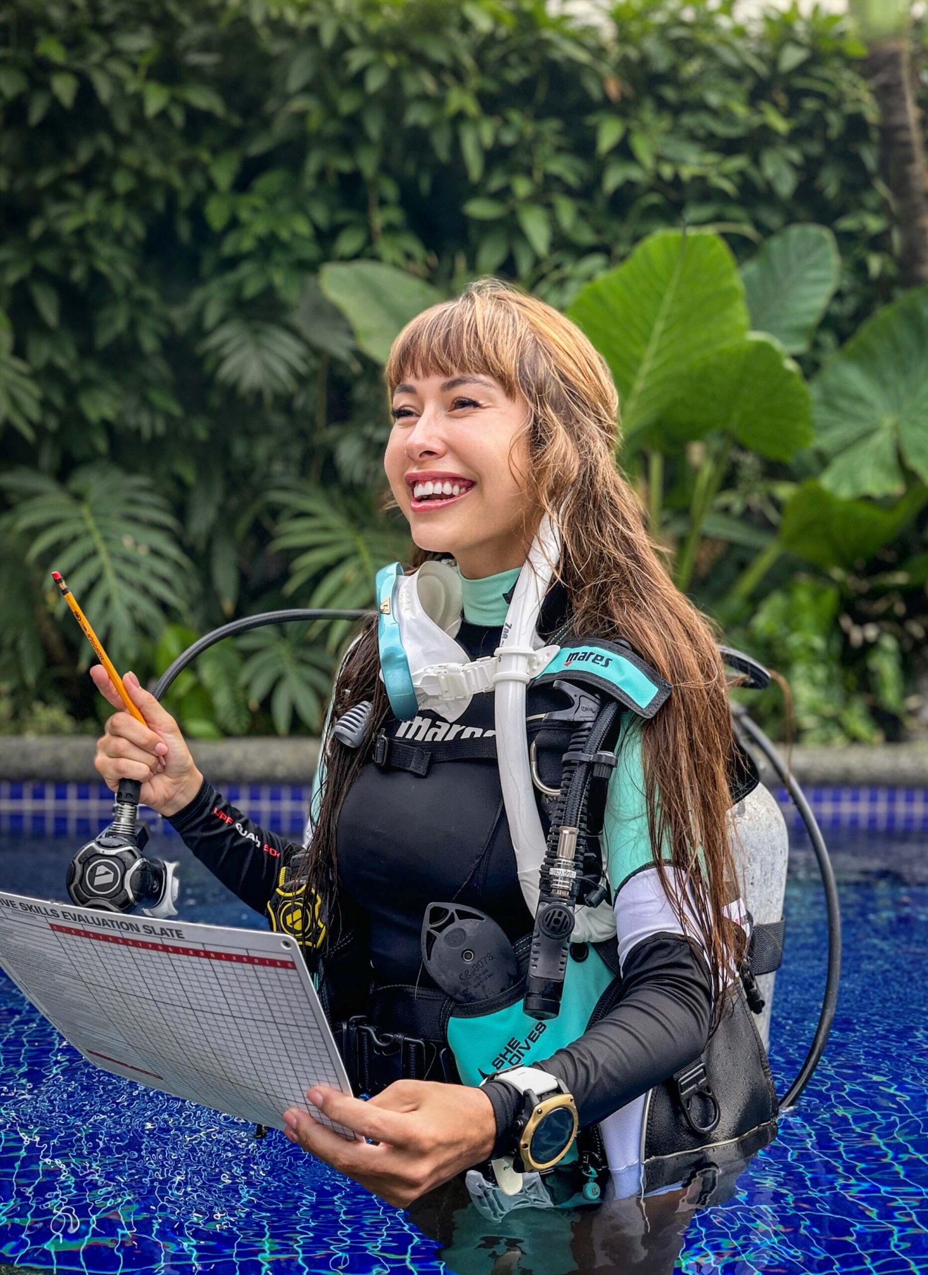 SSI instructor candidate using course materials during dive instructor training in Bali